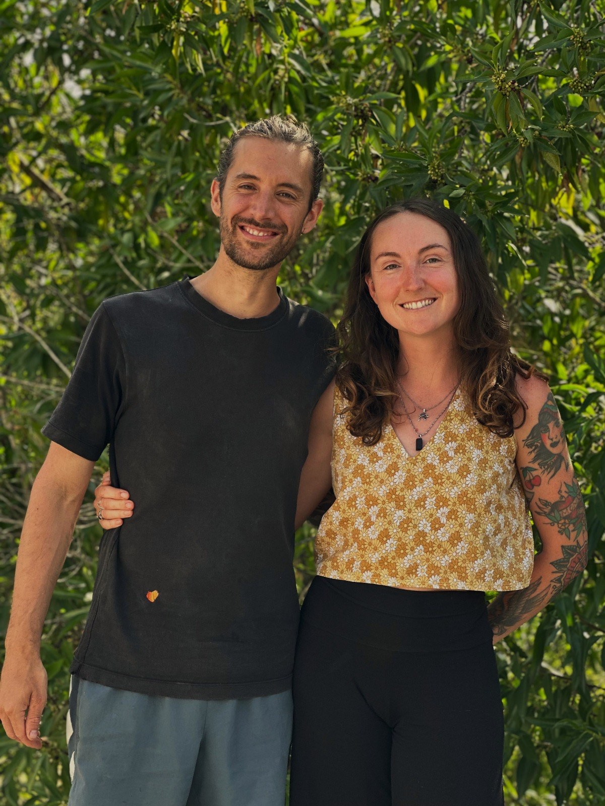 Lindsay and Chris standing together outdoors